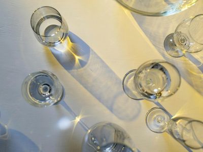 Sunlight reflecting through a glass prism on a wall